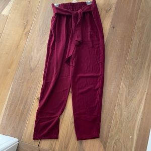 Burgundy paper bag pants with waist tie